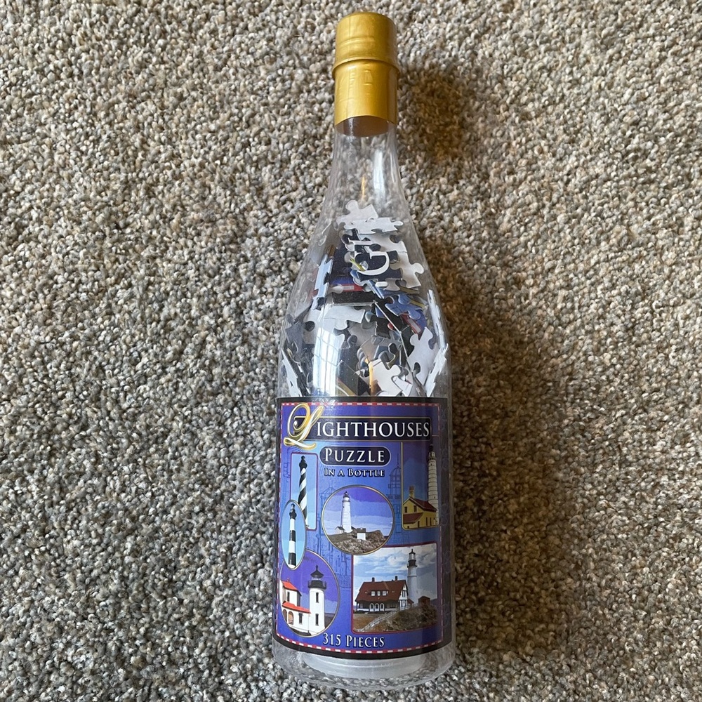 🌺5/$15!! NWT lighthouse in a bottle puzzle